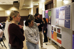Attendees View Poster Presentations by Southwestern Oklahoma State University
