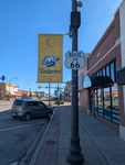 Route 66 sign and banner by Southwestern Oklahoma State University