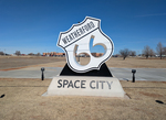 Weatherford Space City sign (white) by Southwestern Oklahoma State University