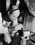 Astronaut Thomas Stafford training in equipment repair before mission