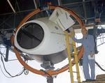 Astronaut Thomas P.Stafford Next to Training Simulator