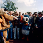 Disney characters greet prime ASTP crewmen to Florida's Disney World