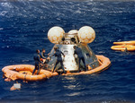 ASTP Apollo Command Module awaits pickup by prime recovery ship