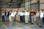 KENNEDY SPACE CENTER, FLA. - The Stafford-Covey Return to Flight Task Group (SCTG) visits the Columbia Debris Hangar . Chairing the task group are Richard O. Covey (third from right), former Space Shuttle commander, and Thomas P. Stafford (fourth from right), Apollo commander. Chartered by NASA Administrator Sean O’Keefe, the task group will perform an independent assessment of NASA’s implementation of the final recommendations by the Columbia Accident Investigation Board.